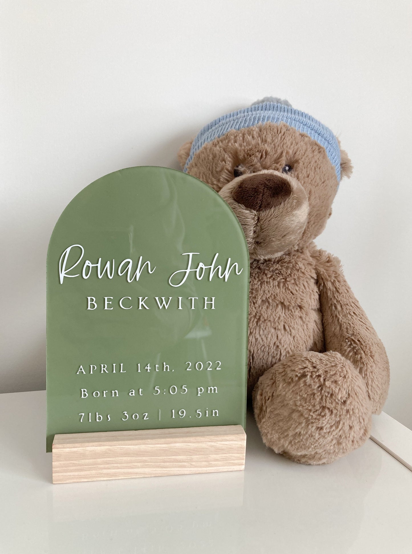 acrylic baby stats arch. Includes name, date, time,weight, and height.